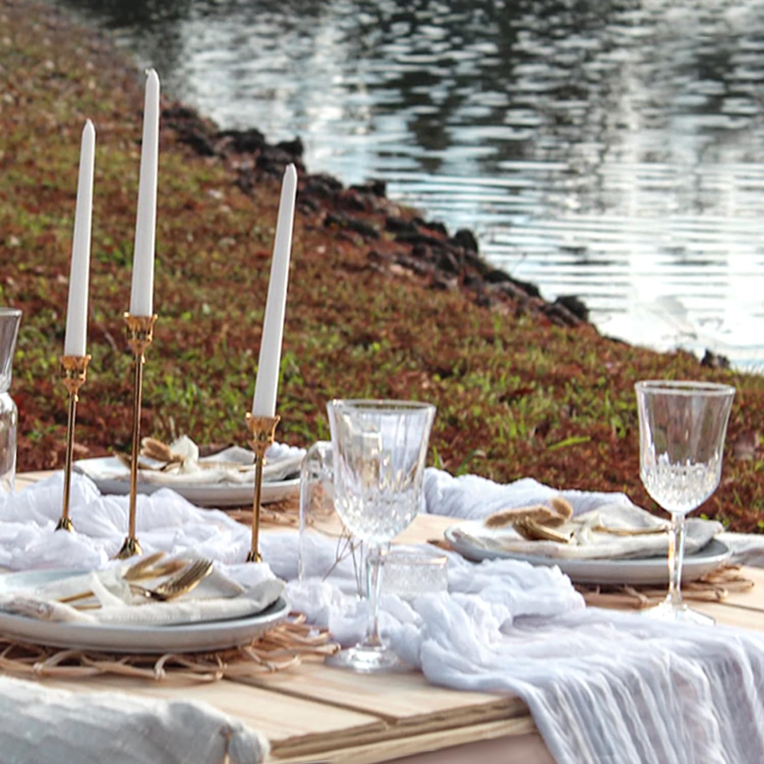 BLUETOP guest table setup with white gauze runner.