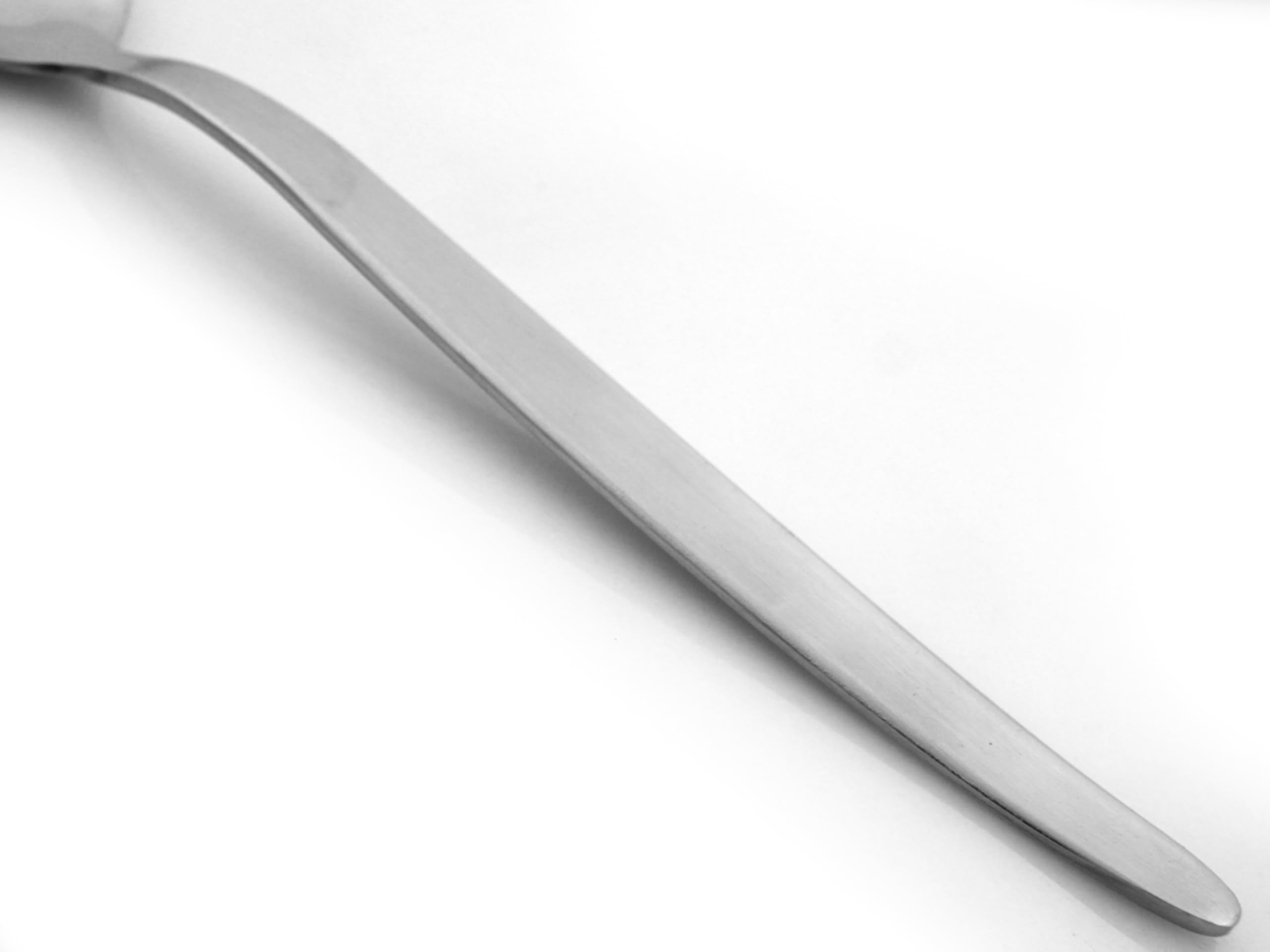 Kunz spoon as a versatile serving spoon for sides and sauces.