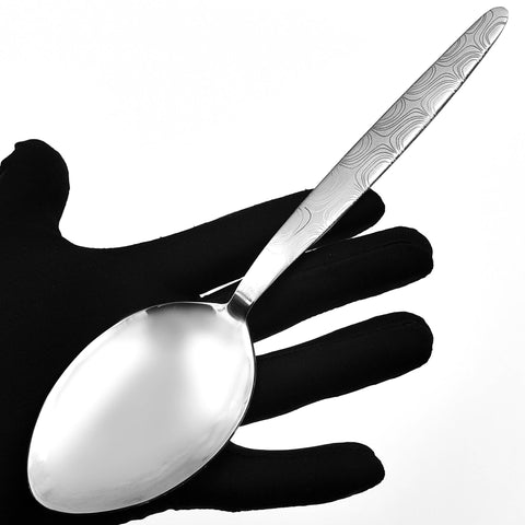 BNAZIND Kunz spoon is a sturdy tool for scooping heavy toppings without spills.