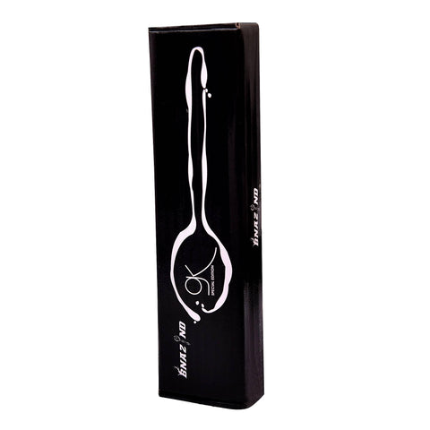 Kunz spoon in a kitchen scene prepared for sauces and plating.