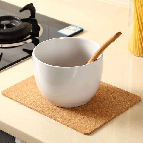 Boao slim cork mat fits under mugs and pots without bulk.
