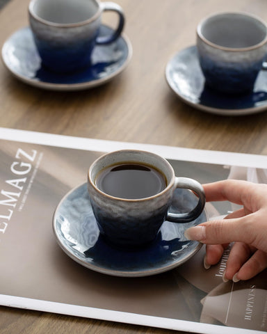 Boilmerit dishwasher-safe espresso cups with gradient glaze for easy cleaning.