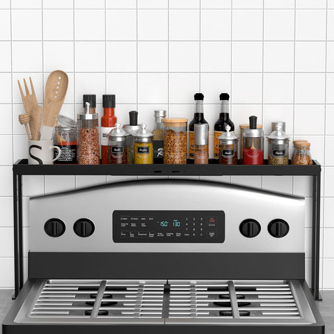 BOIVSHI Stove Top Shelf installed on stove, increasing spice storage and countertop organization.