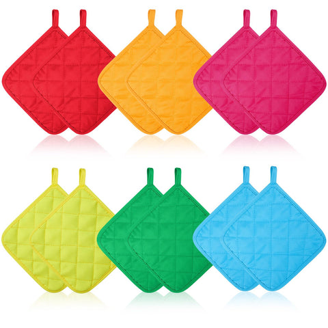 Bokon pot holders set with twelve colorful pieces for versatile kitchen use and hand protection.