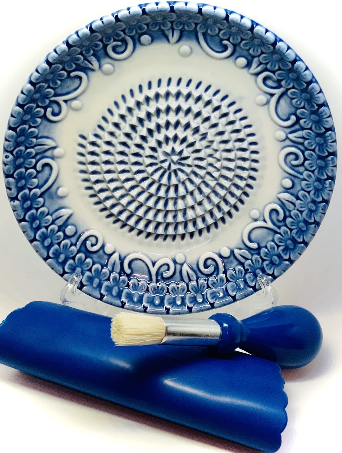 BonCera ceramic grater plate with blue embossed design for fast garlic and ginger prep.