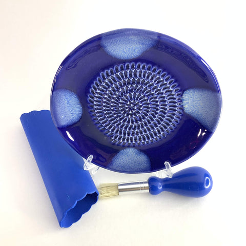 BonCera gathering brush removes shredded bits for easy cleanup