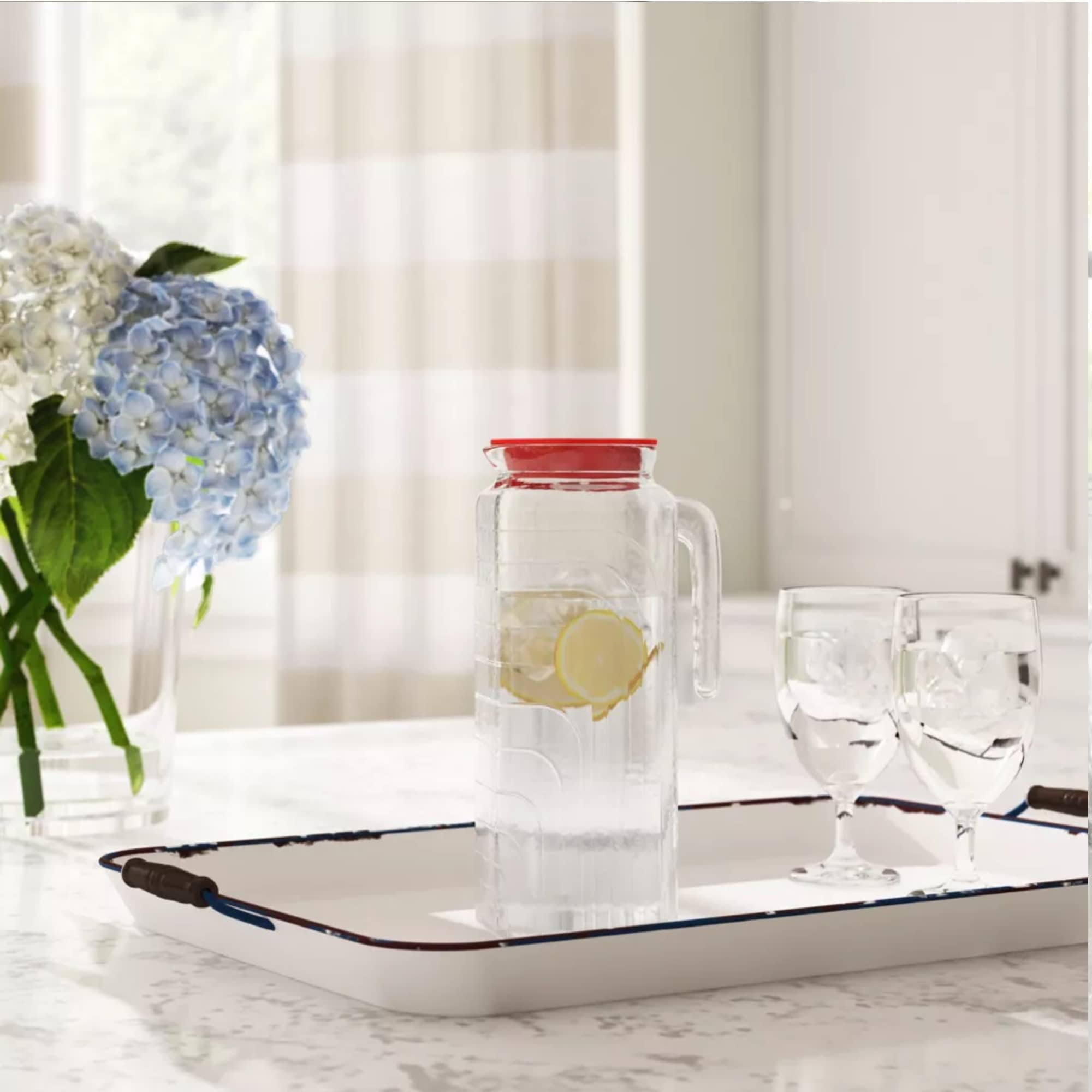 Bormioli Rocco Gelo jug pouring action for smooth, mess-free serving.