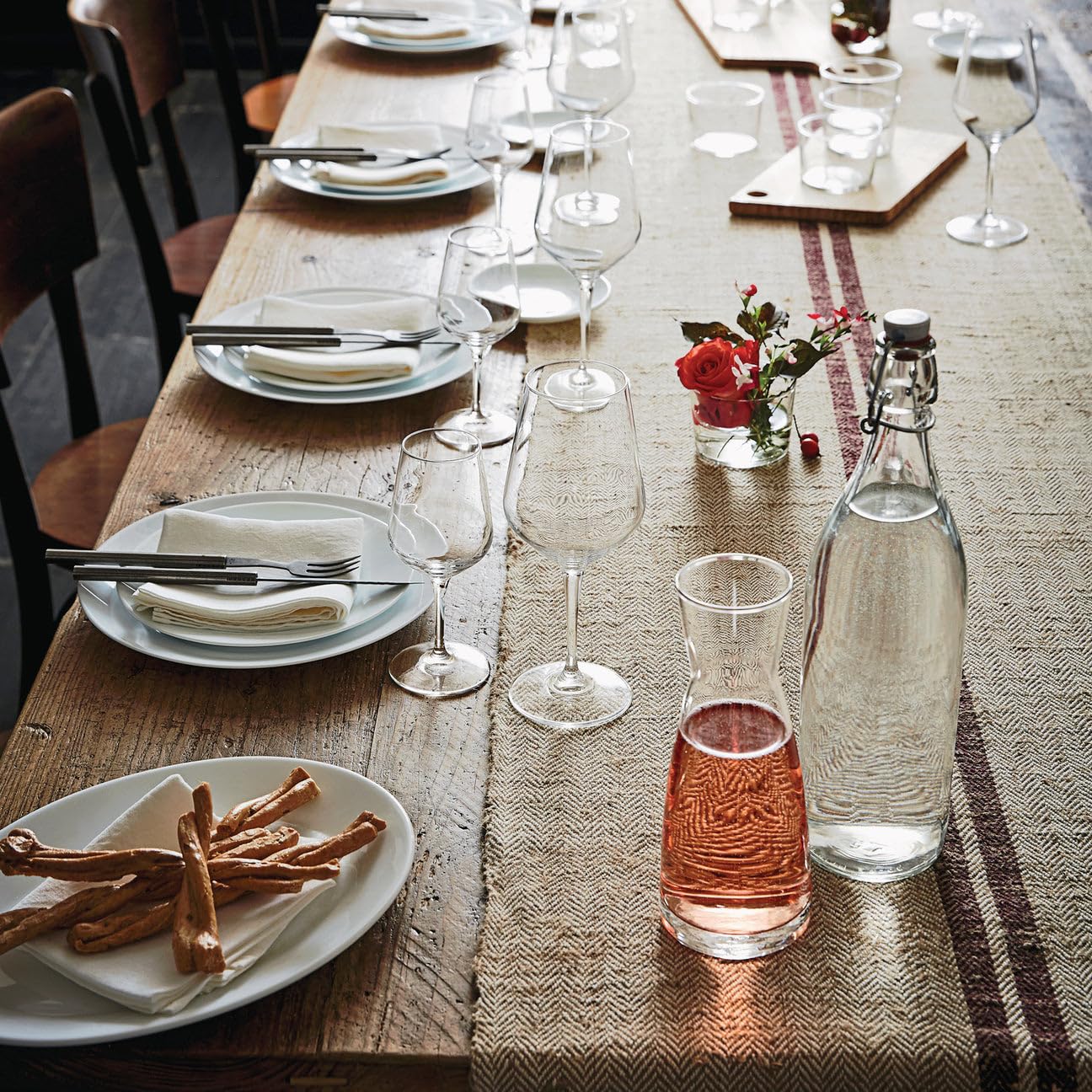 Blue Giara bottle crafted in Italy enhances kitchen ambiance.