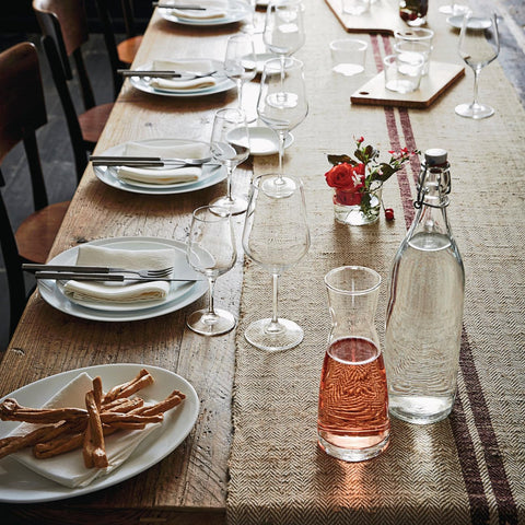 Blue Giara bottle crafted in Italy enhances kitchen ambiance.