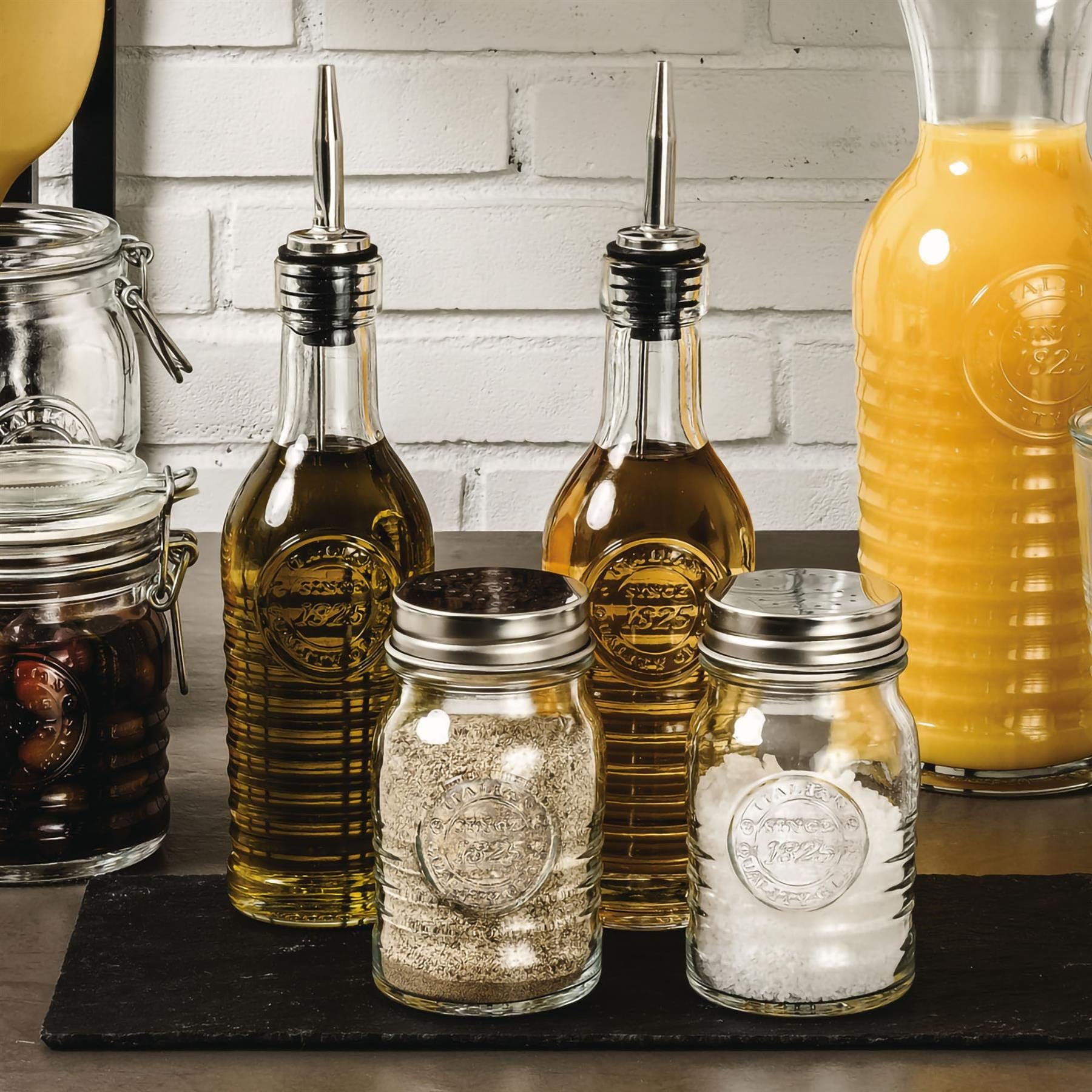 Bormioli Rocco Officina 1825 glass bottle close-up highlights industrial-cut glass design.