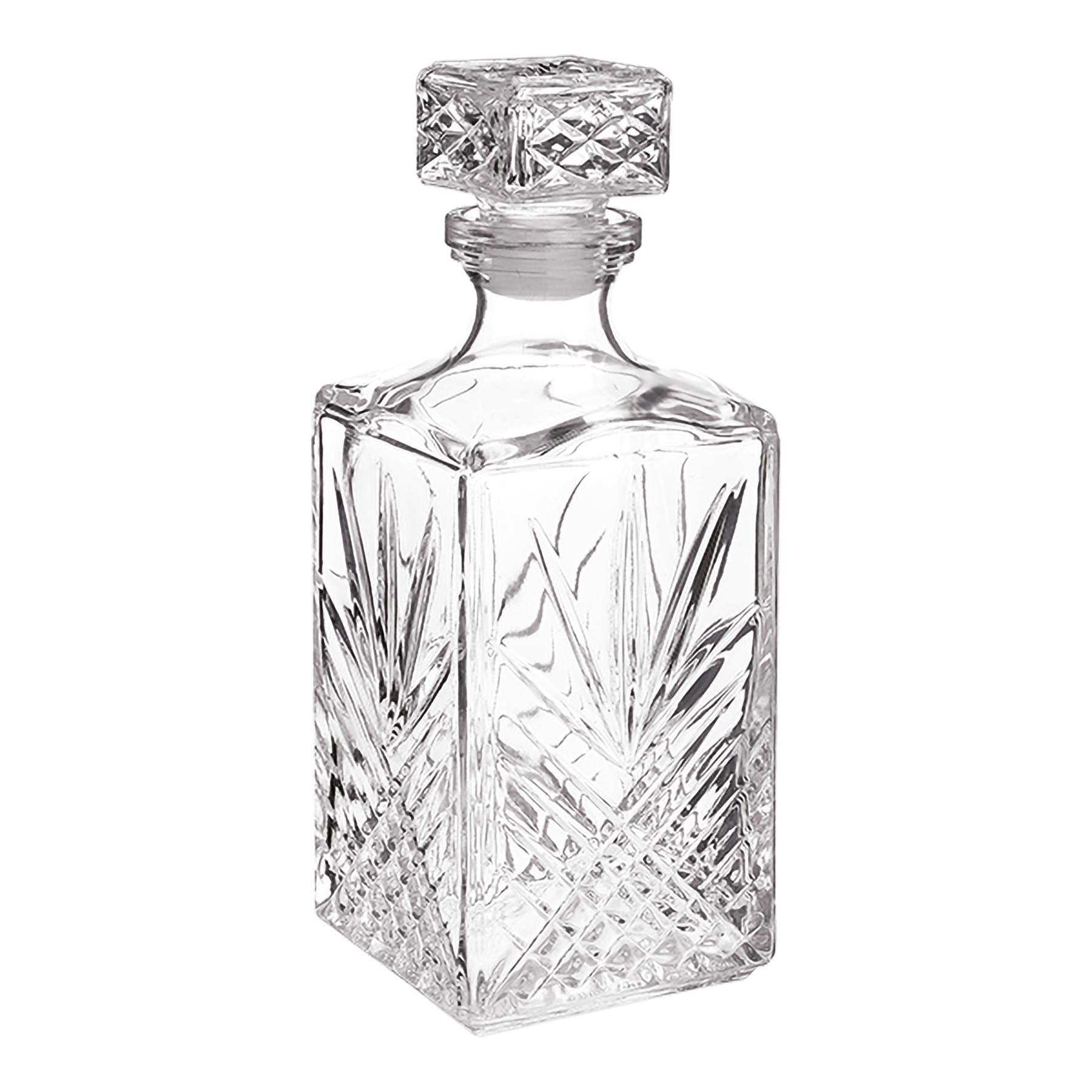 Bormioli Rocco Selecta decanter with starburst detailing enhancing light reflections.