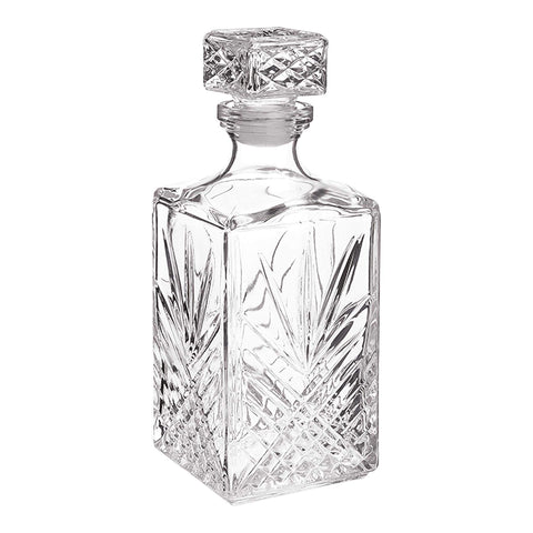 Bormioli Rocco Selecta decanter with starburst detailing enhancing light reflections.