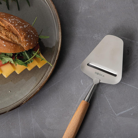 Boska Amigo slicer features a stainless steel blade for precise cuts.