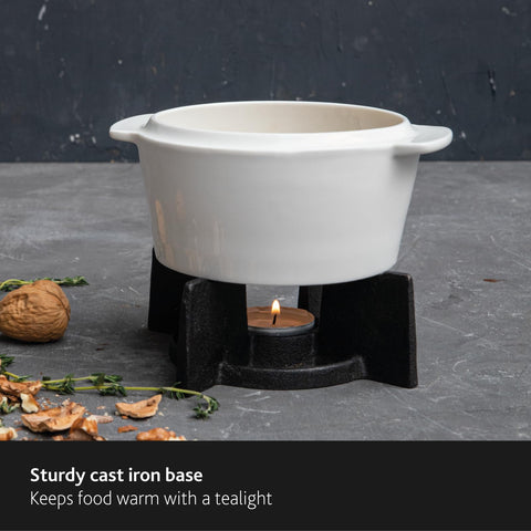 Cast-iron base elevates BOSKA brie baker for easy access.