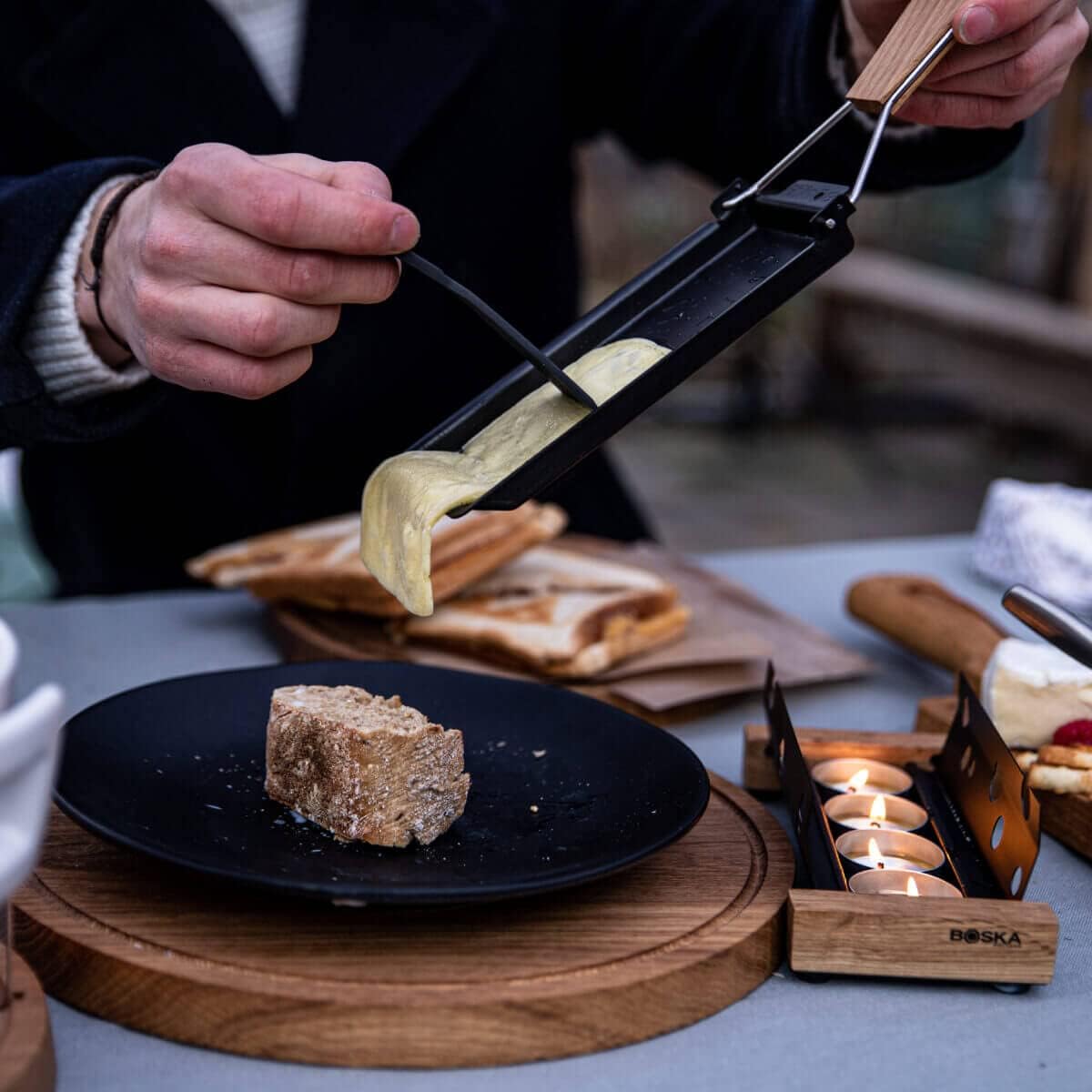 Boska Partyclette To-Go barbeclette pan ready for melted cheese on grill.