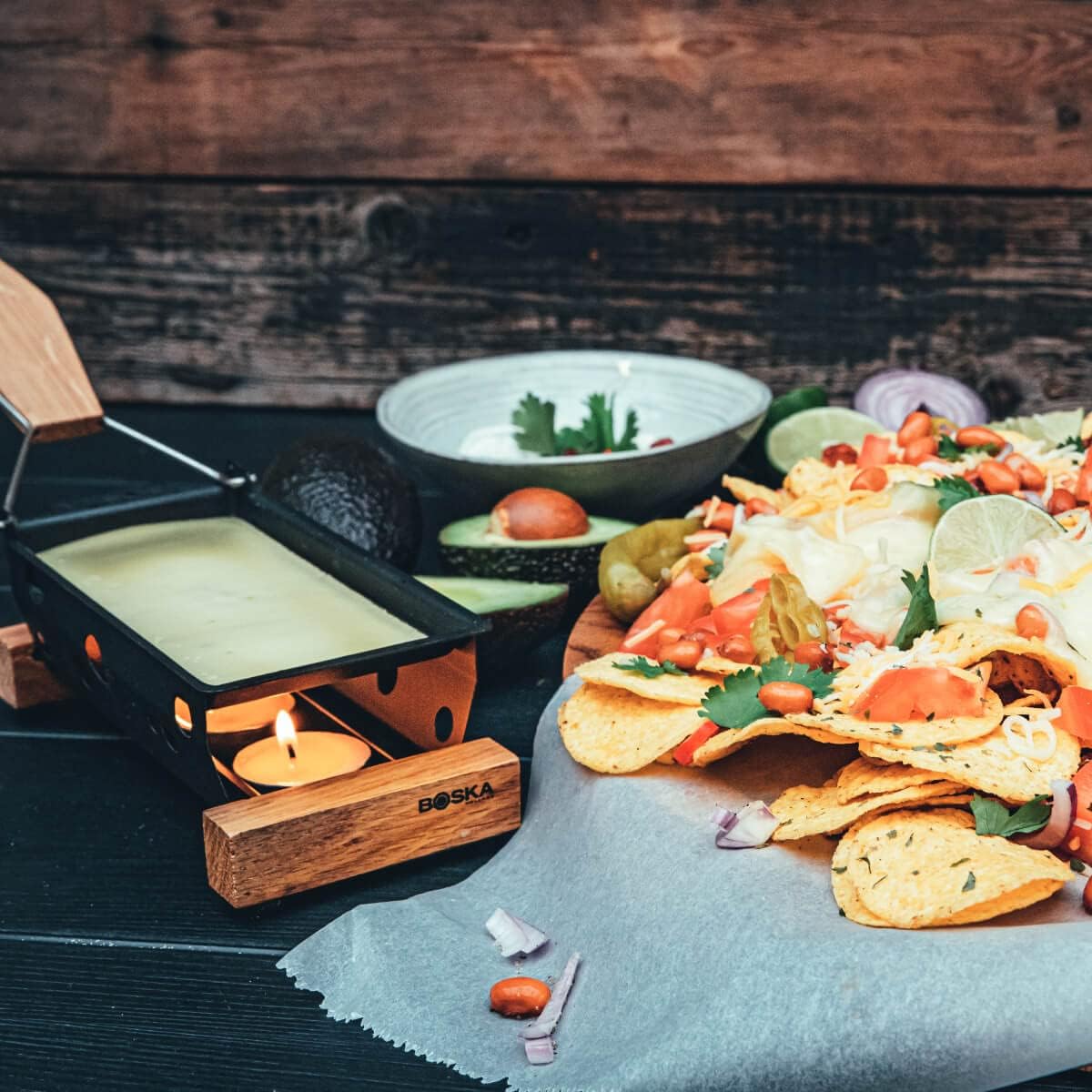 Boska Partyclette To-Go melts cheese on baguette slices for easy bites.