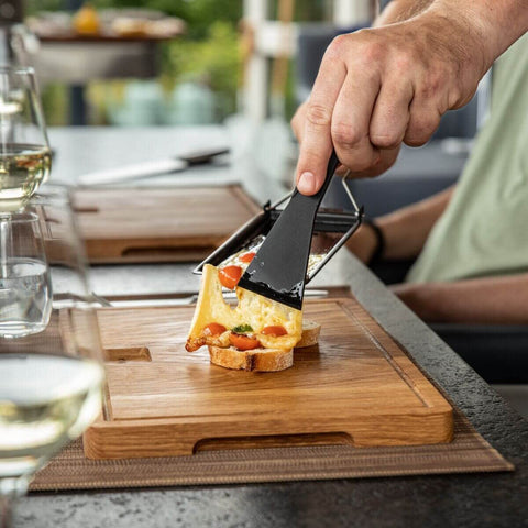 Boska Milano candles lit for portable heat during an on-the-go feast.