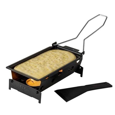 Boska Milano raclette set on table, ready for a cozy melt and social dining.