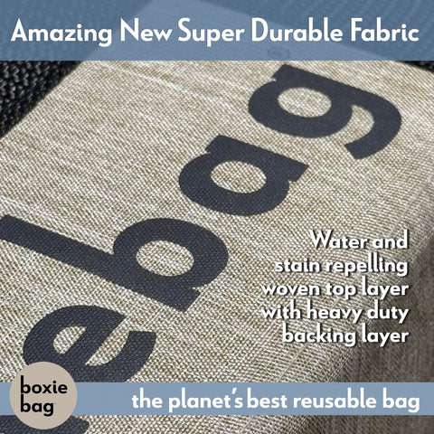 Boxiebag with side handles demonstrates easy one-handed carrying during shopping