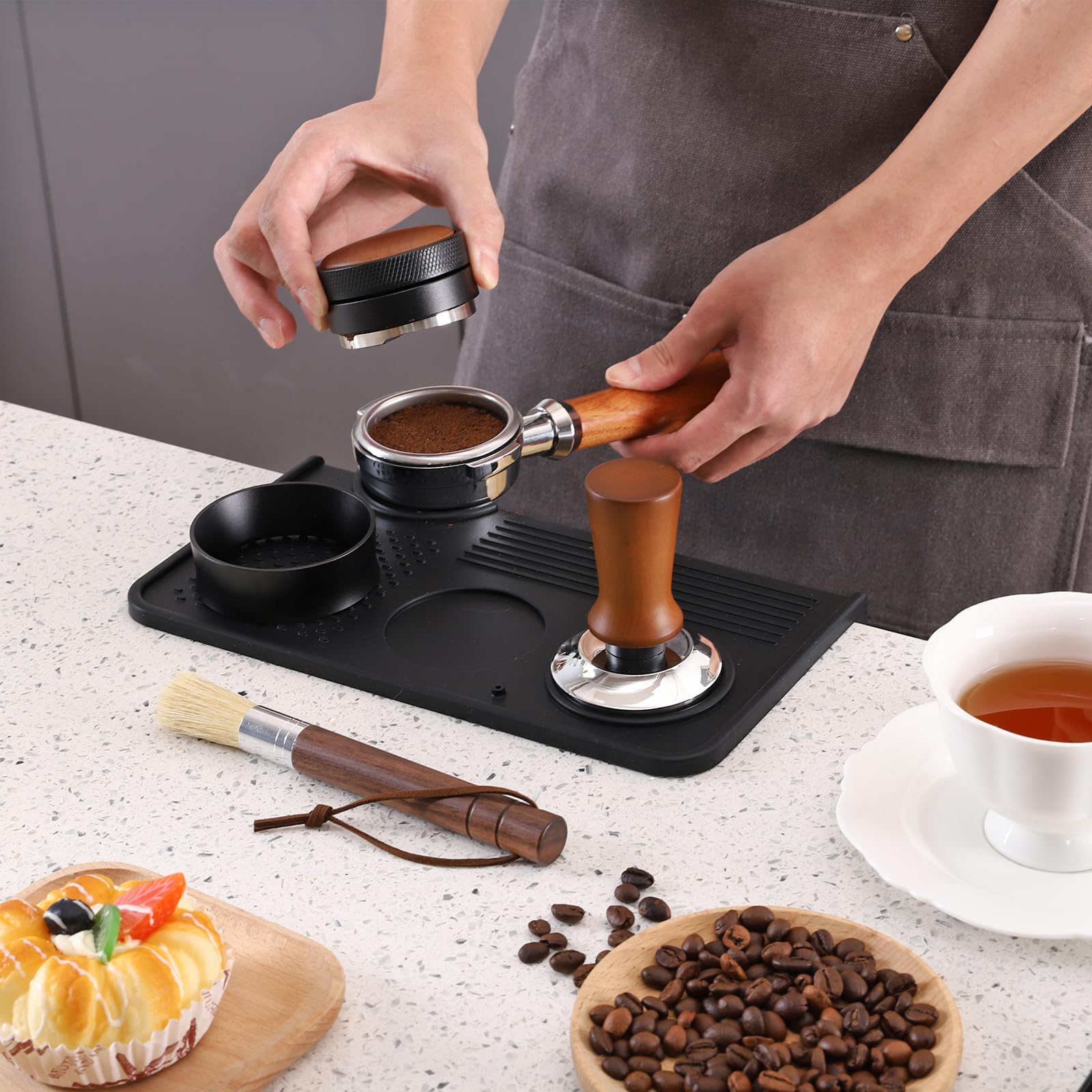 Breewenf multi-slot textured tamping mat keeps tools organized.