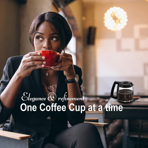 BRENSTEN carafe with black handle offers secure, comfortable pouring.