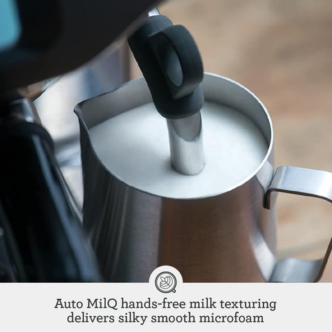 Automatic microfoam wand creates velvety milk texture for latte art.