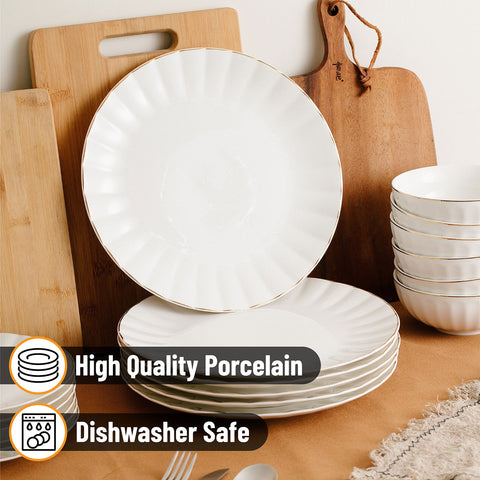 Brew To A Tea dinnerware with elegant gold trim adds timeless sophistication.