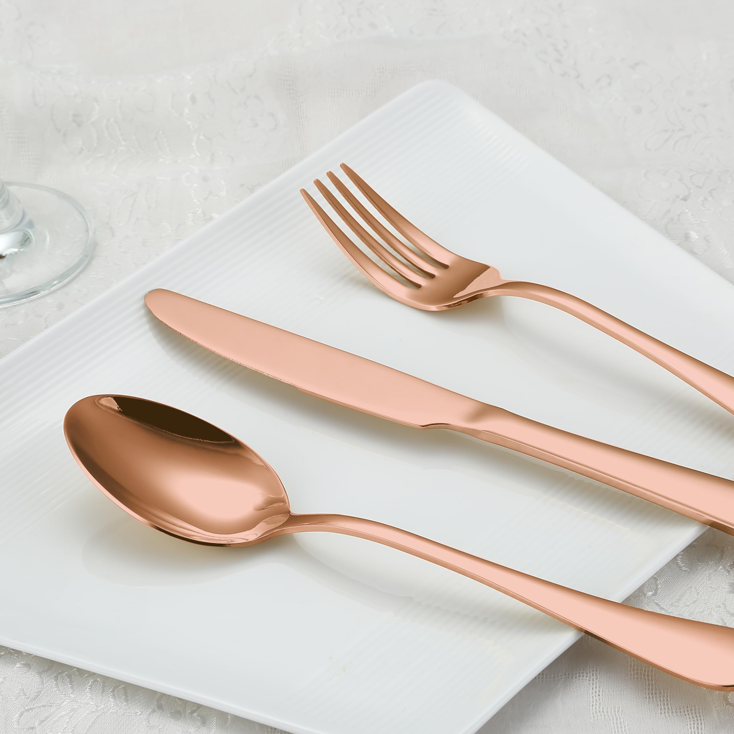 BRIOUT rose gold flatware spoons closeup shows premium finish and smooth edges.