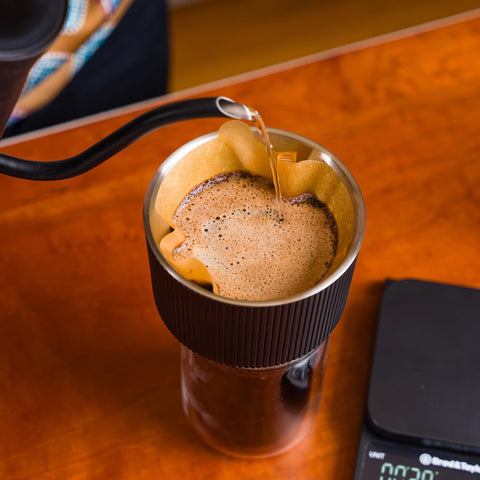 Brod and Taylor 304 stainless steel dripper in action over a carafe for consistent extraction.