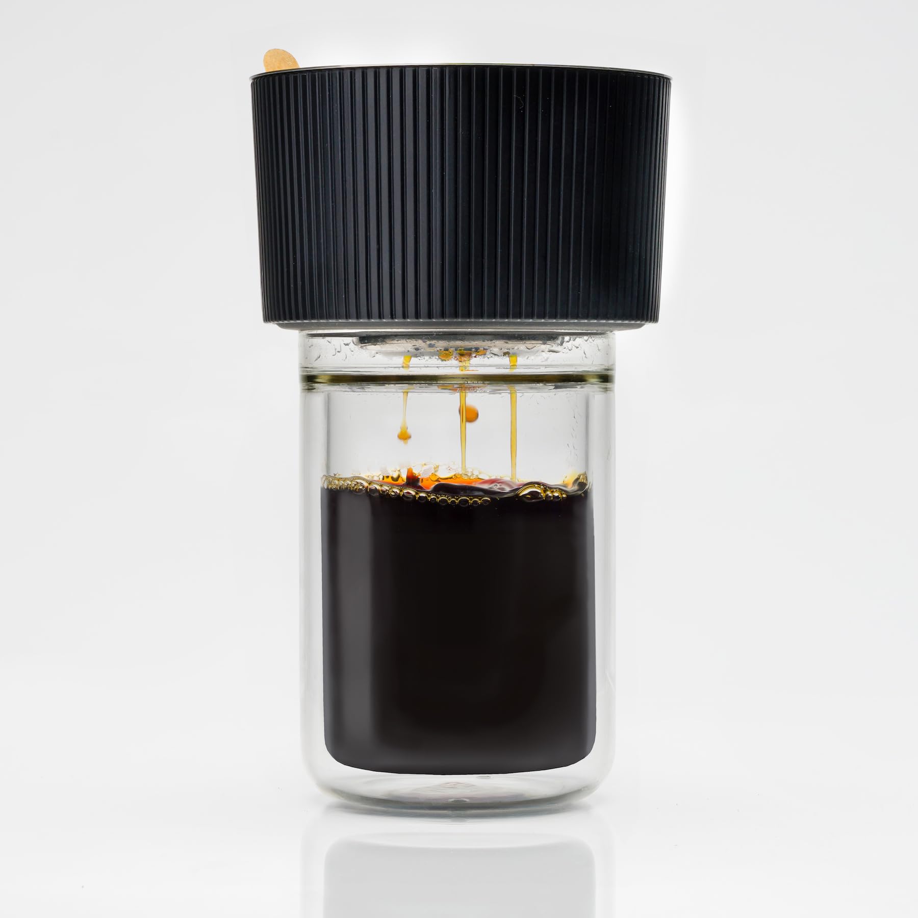 Brod and Taylor dripper secured with non-slip rubber on a cup for stable brewing.