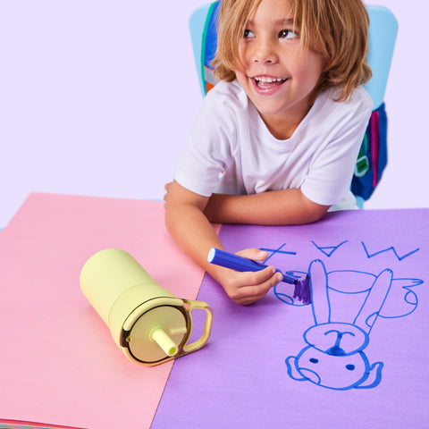 BrüMate Leap handle design and cup holder compatibility for kids on the go.