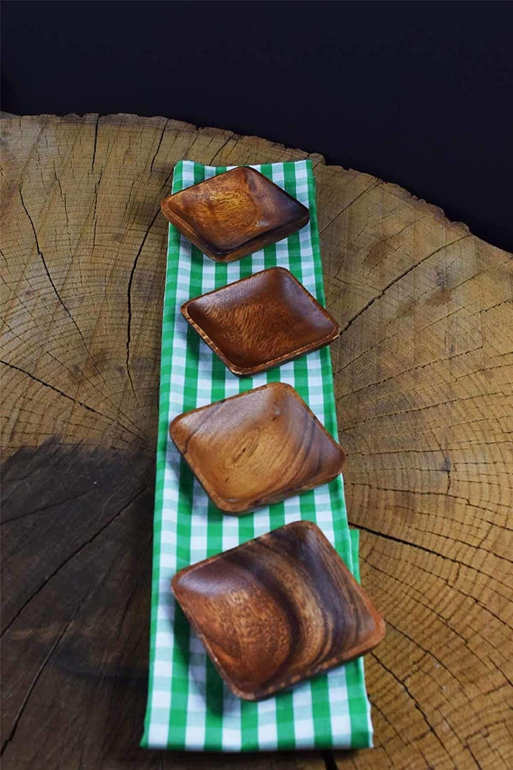 Elegant table setting showing four bowls ready for appetizers.