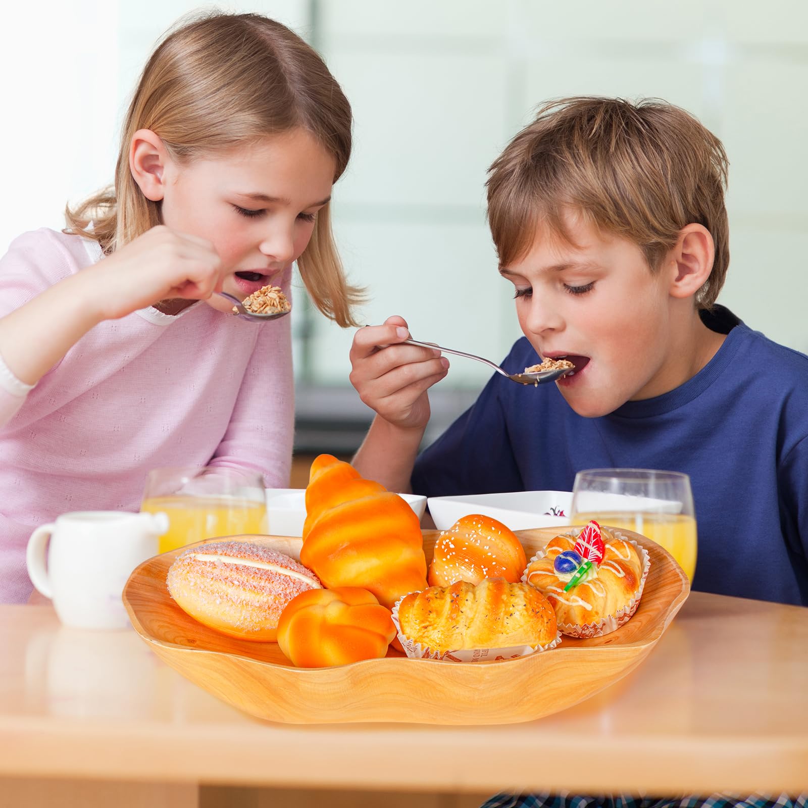 BTEOBFY wooden fruit basket provides easy spill-clean display on the counter.