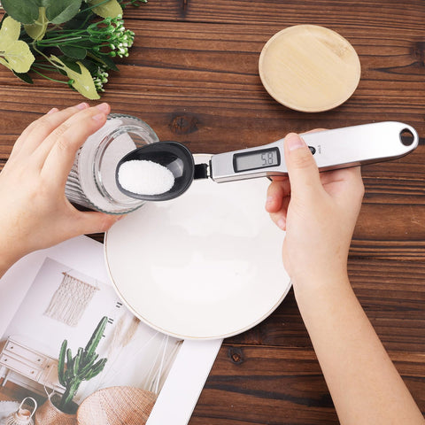 BTFO compact digital scale resting on a kitchen counter for ready use.