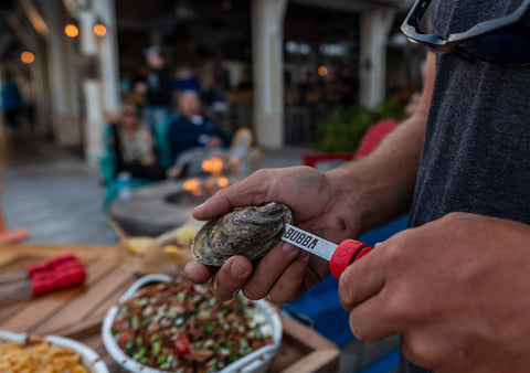 Durable kitchen tool from BUBBA suitable for raw or steamed oysters.