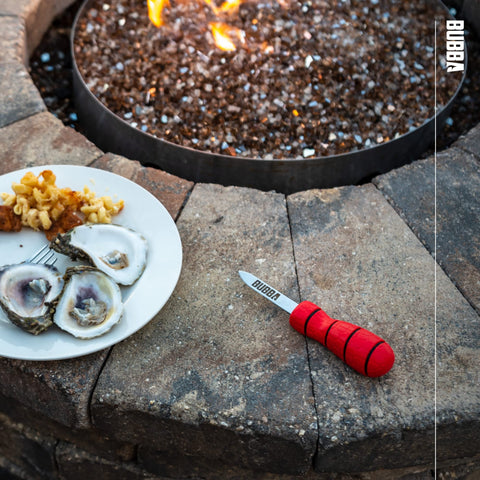 BUBBA shucking knife with non-slip handle for secure grip even when wet.