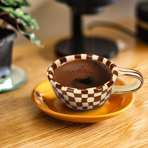 BuleVina checkered mug stacked display, ceramic quality for long-lasting use.