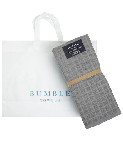 Bumble Towels care close-up shows machine wash warm instruction