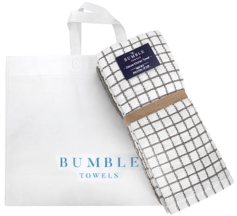 Close-up of Bumble Towels kitchen towel, soft cotton feel in gray.
