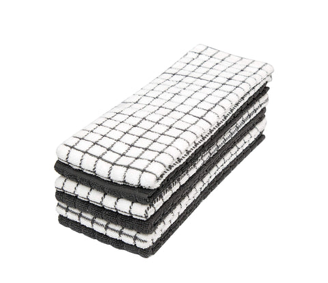 Towel folded on the counter, highlighting soft texture and durable weave of Bumble Towels.