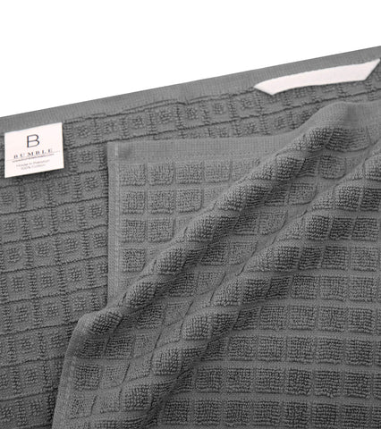 Bumble Towels hanging loop for easy drying and storage.