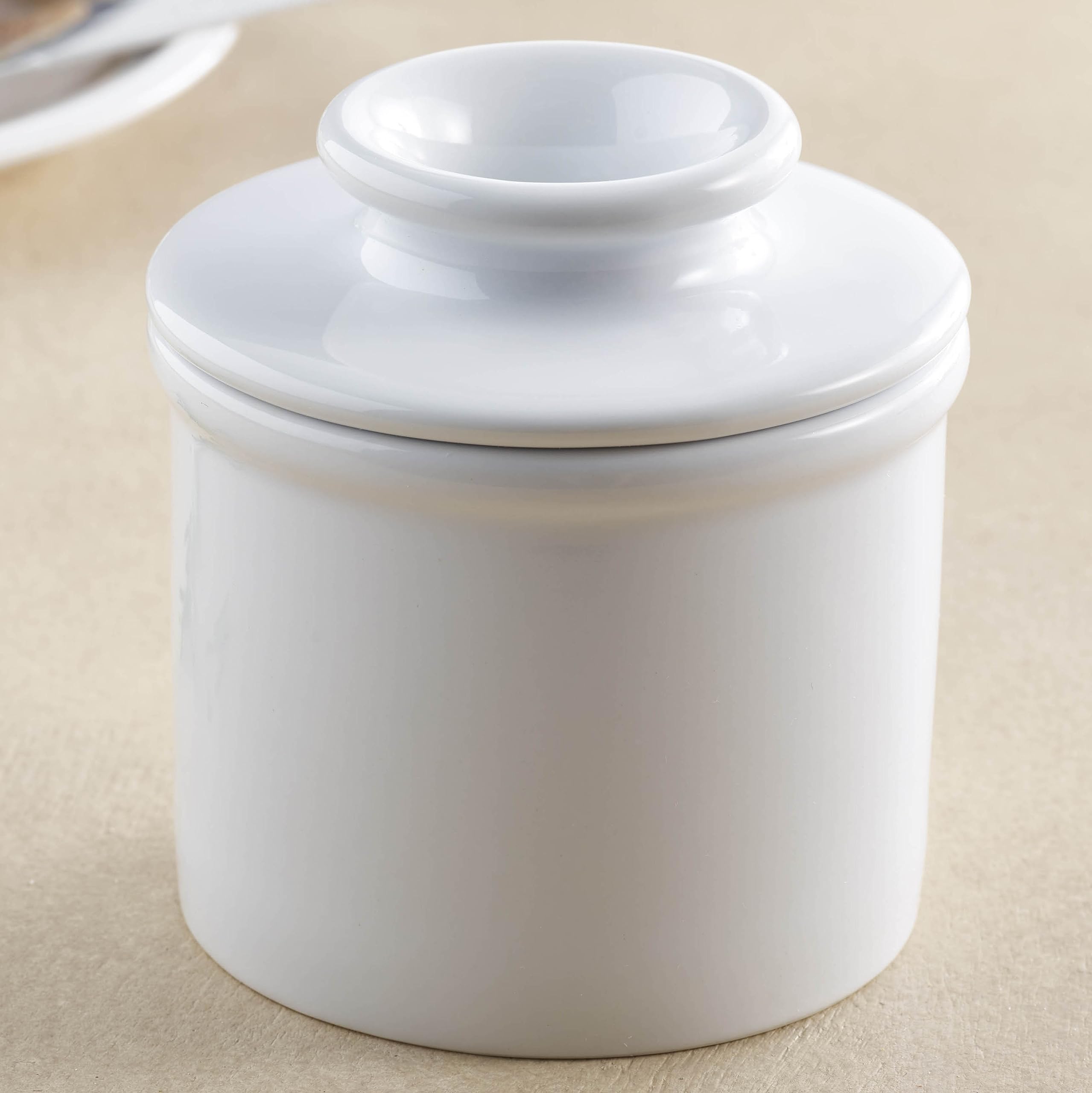 Base with water method and butter packed in lid, ready for serving.