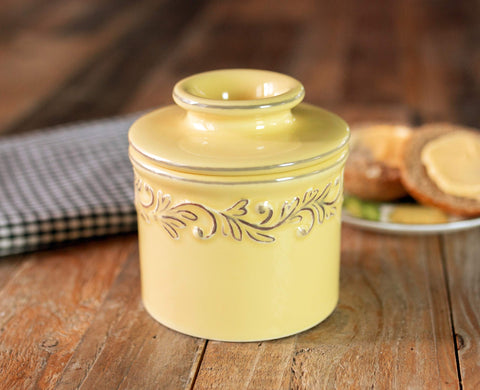 Butter Bell embossed vine leaves detail shows vintage Provencal charm.