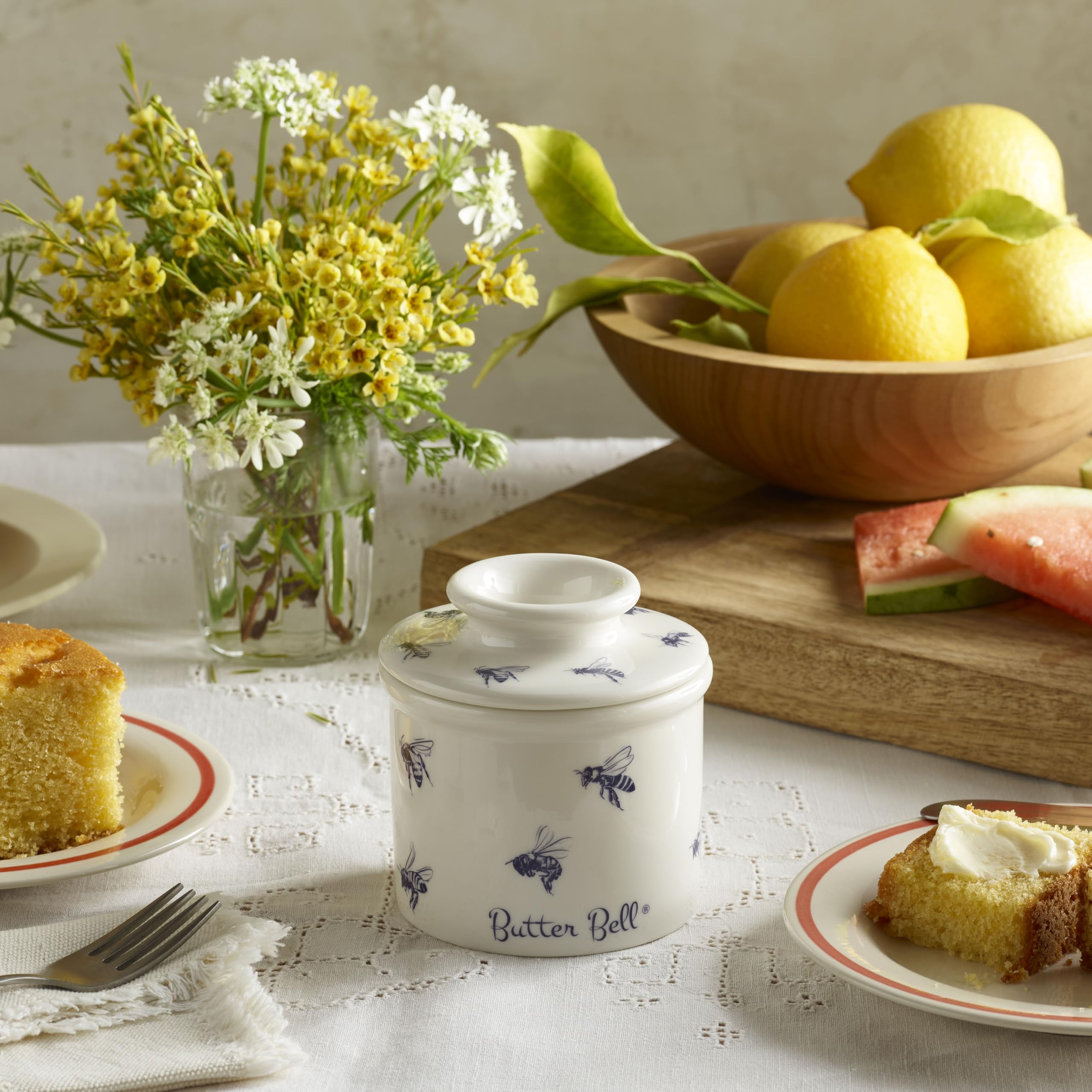 Butter Bell honey-bee-pattern lid showcasing cohesive kitchen style and contoured serving.