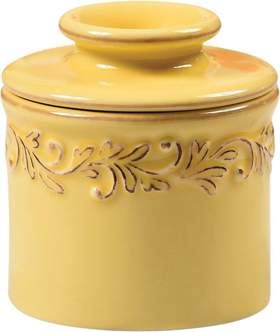 Butter Bell Original Goldenrod crock on counter keeps spreadable butter accessible.