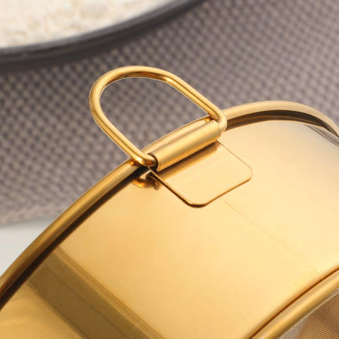 Buyer Star flour sifter 6-inch held in hand for precise, easy control.