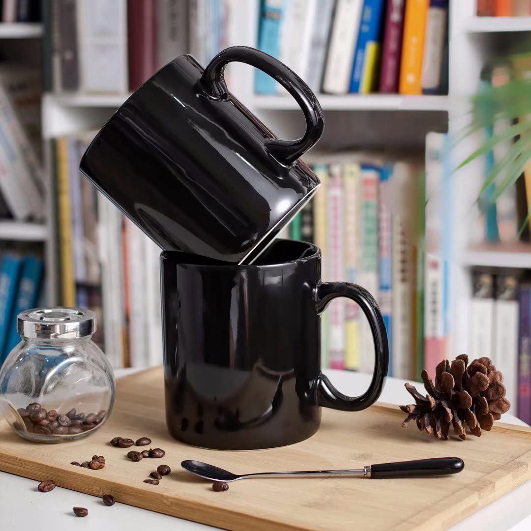 BYCNZB mug held in hand illustrating large ergonomic handle.