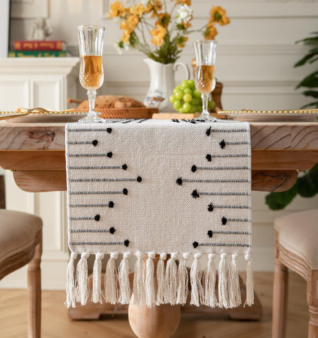 Caflife boho table runner in natural cotton with tassels, elevating dining decor.