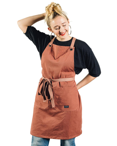 Caldo Crossback Apron front view shows durable midweight cotton and professional fit.