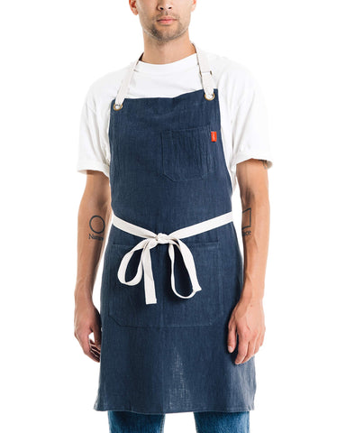 Caldo linen kitchen apron front view, showcasing durable fabric and fit for professionals